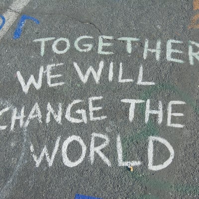 chalk writing on footpath. Moral leadership in the time of Covid