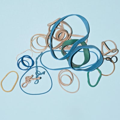 Rubber bands on a blue background, how to fix micromanagement